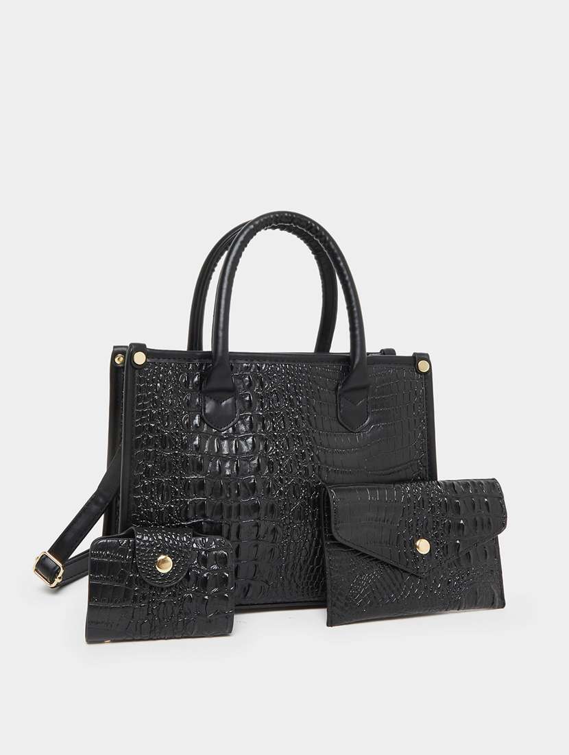 women black textured structured handbag