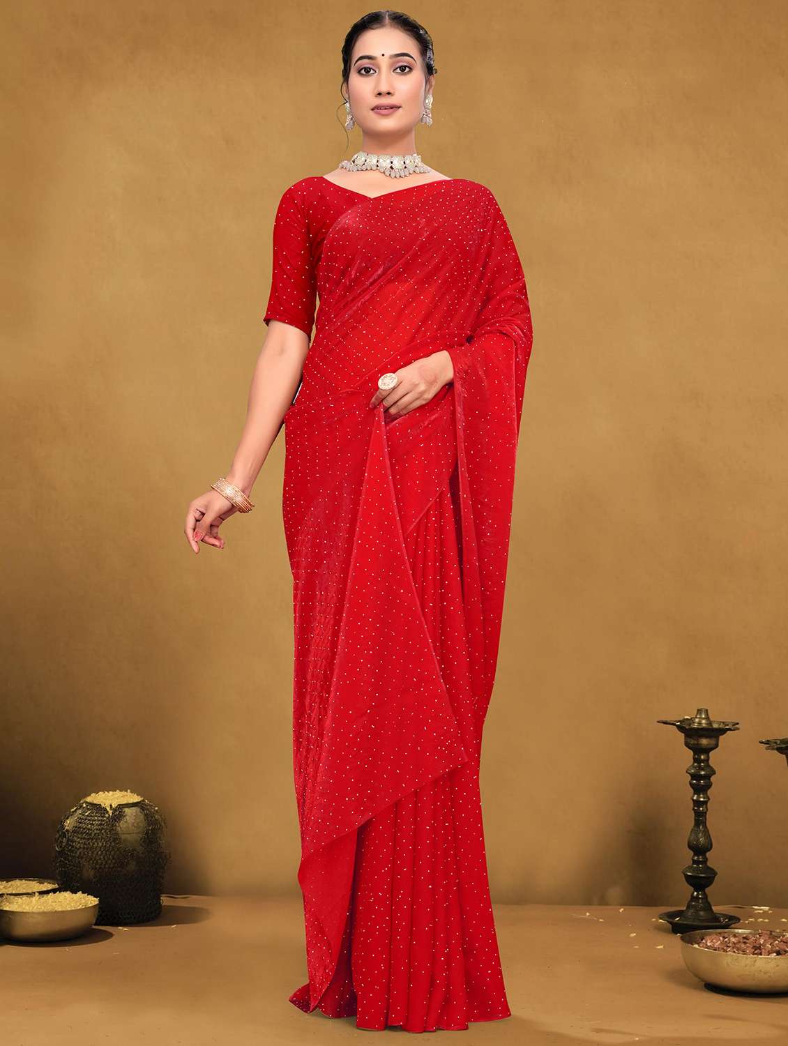 women solid with work embellished saree with blouse