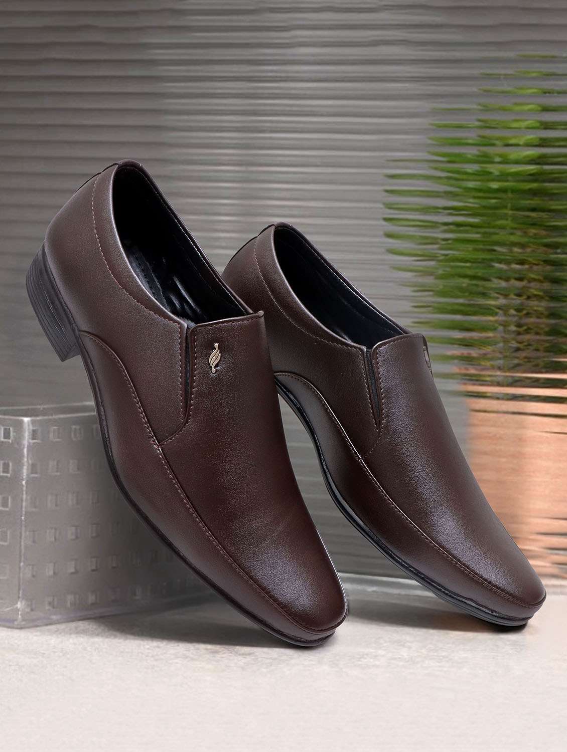 men brown slip on formal shoes