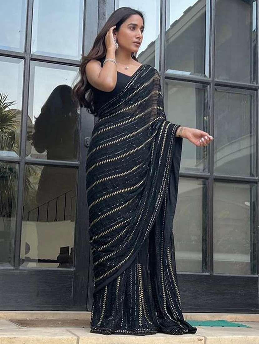 women black embroidered saree with blouse
