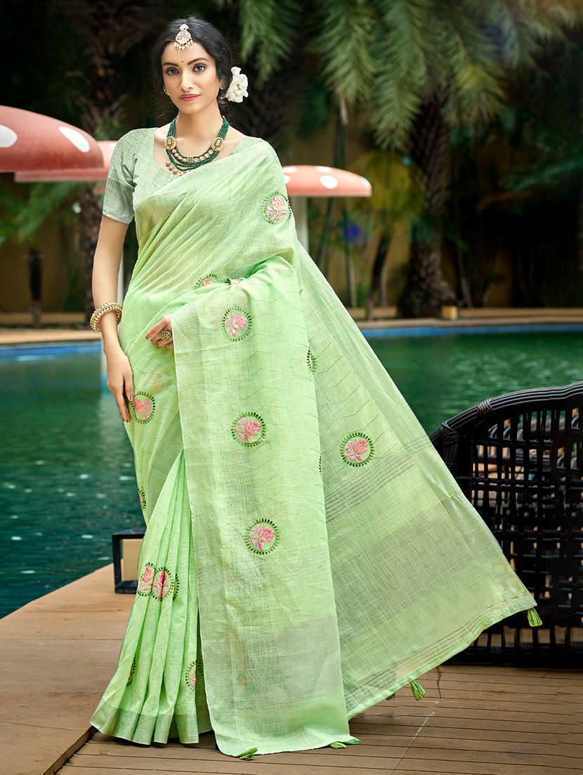women solid with work embroidered saree with blouse