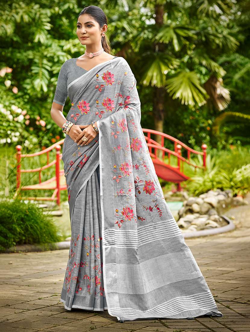 women solid with work embroidered saree with blouse