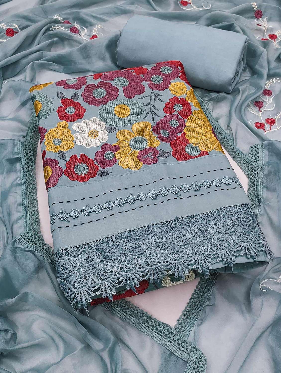 women solid wiith work embroidered unstitched suit set