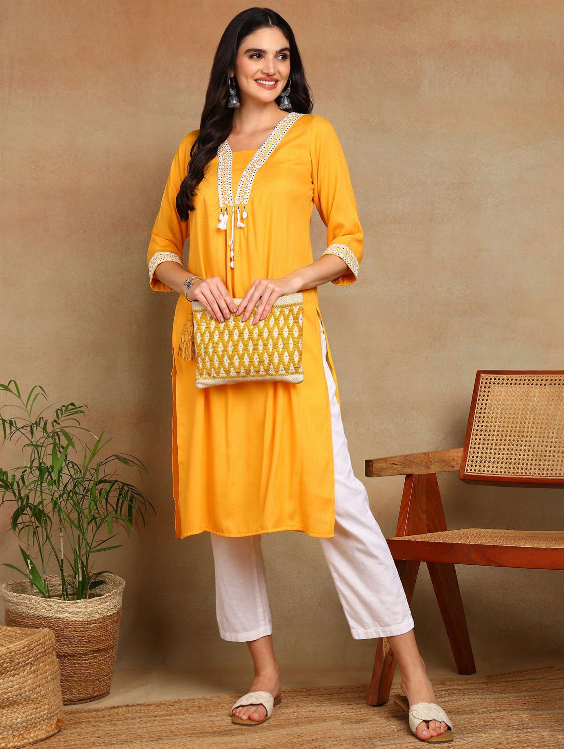 women solid with work three quarter sleeve a-line kurta