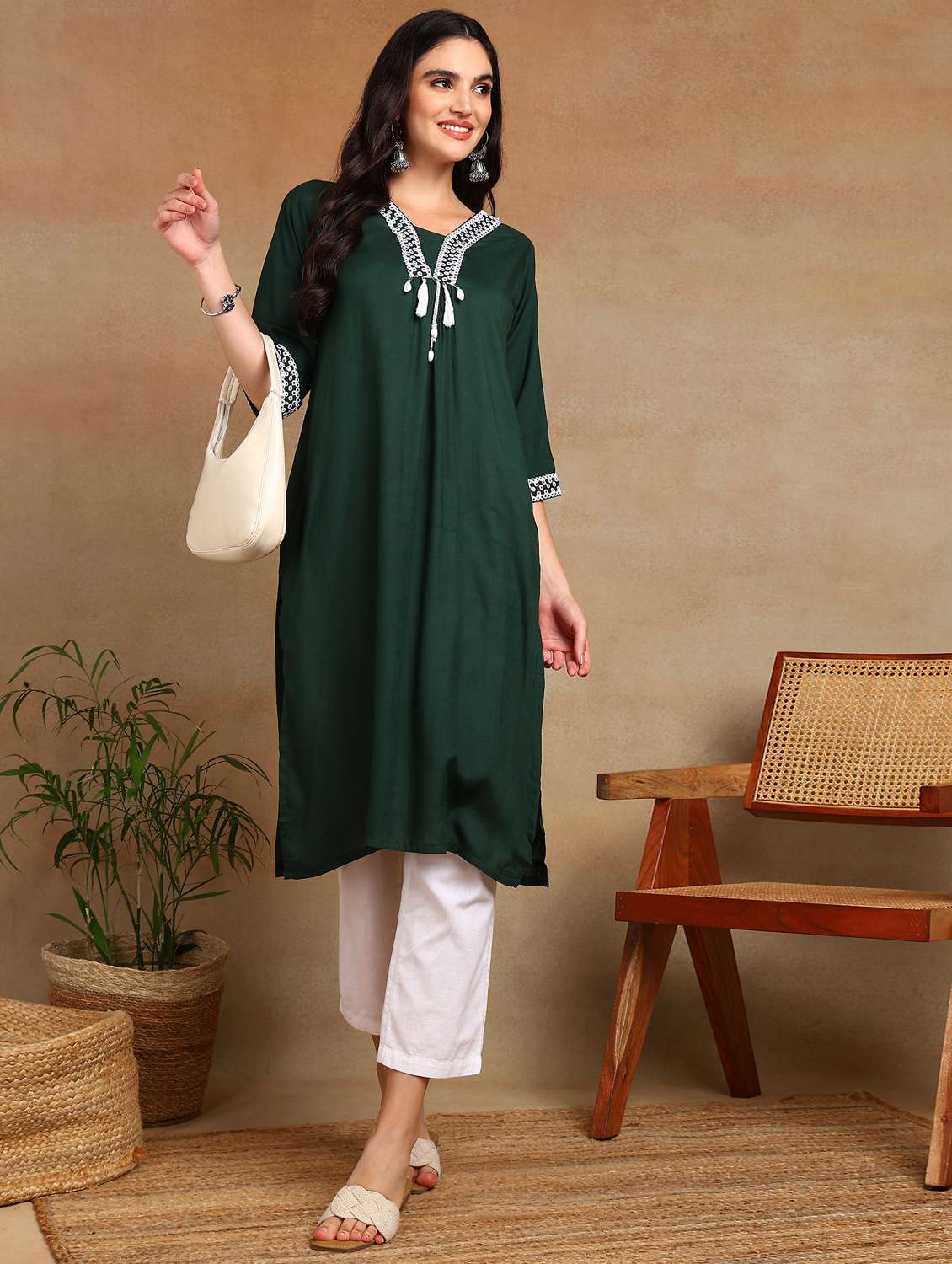women solid with work three quarter sleeve a-line kurta