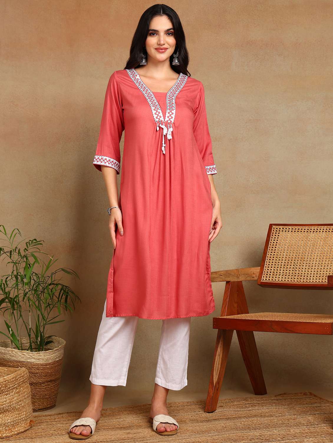 women solid with work three quarter sleeve a-line kurta