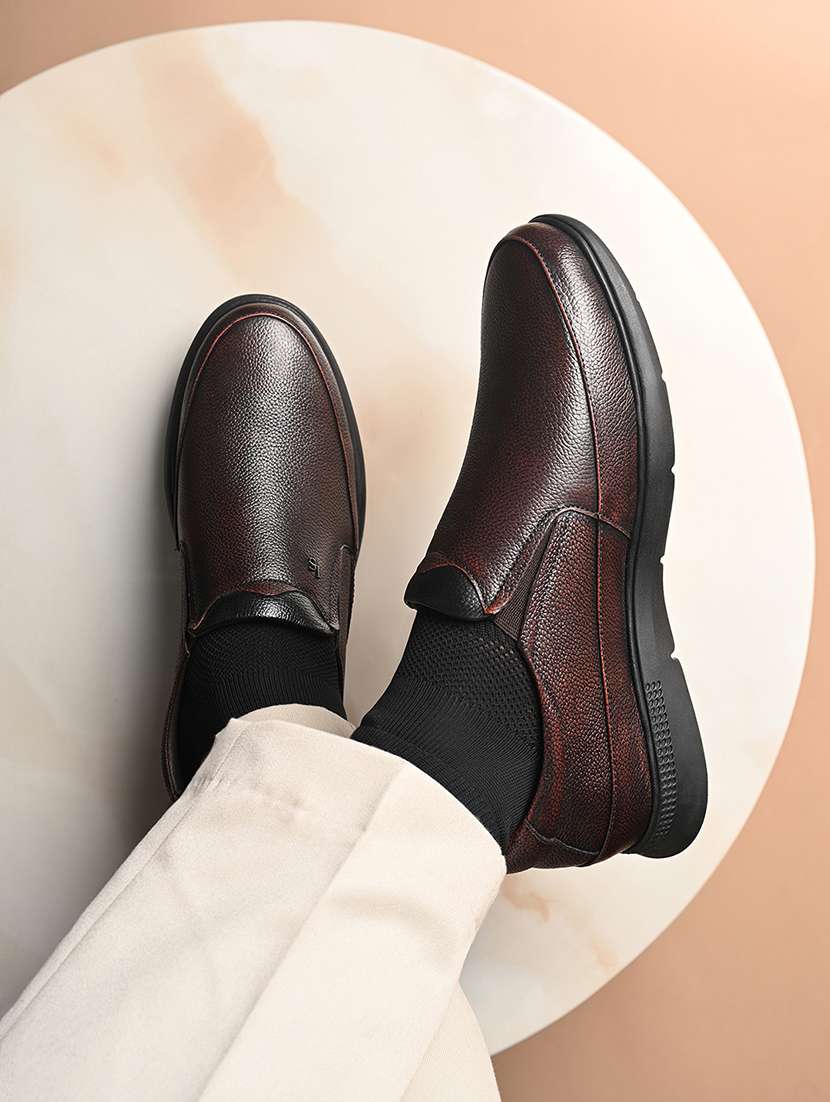 men brown slip on formal shoes