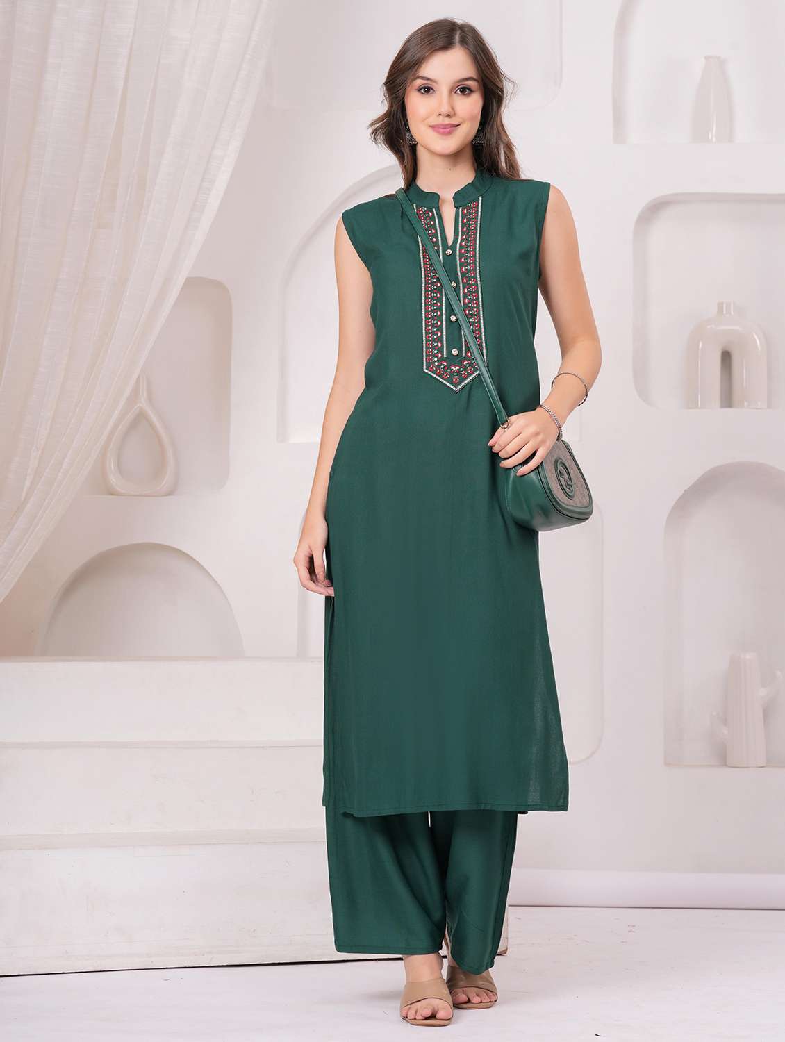 women embroidered sleeveless kurta palazzo set
