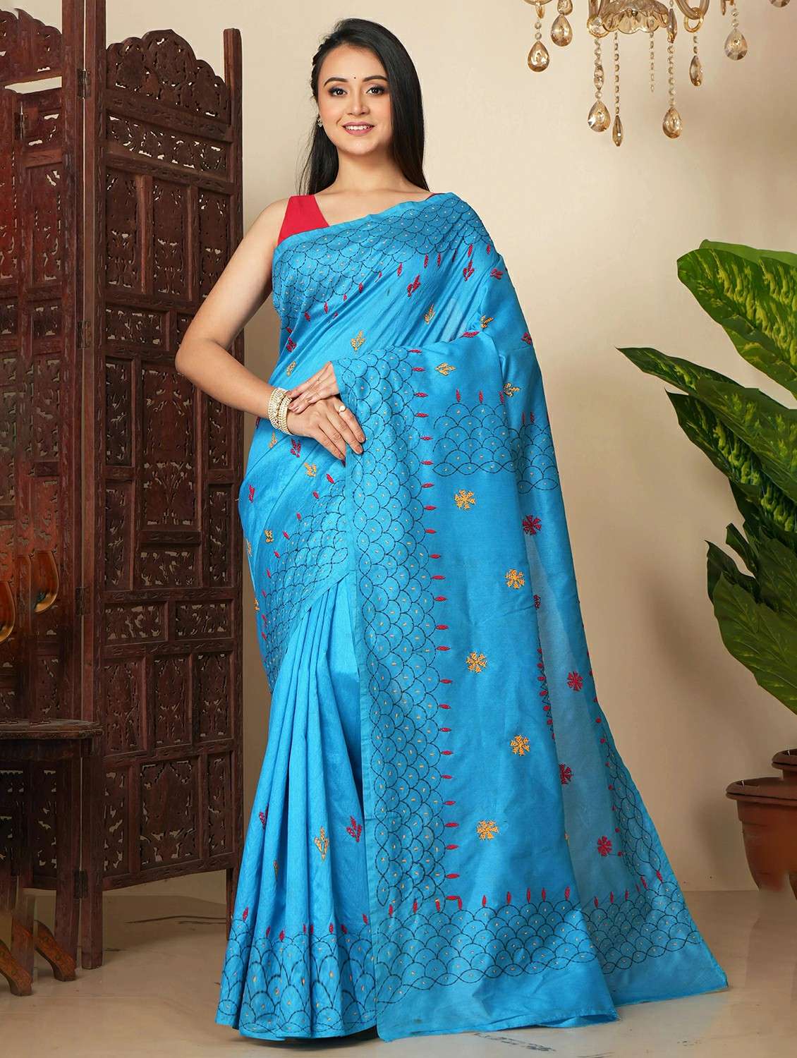 women solid with work embroidered saree with blouse