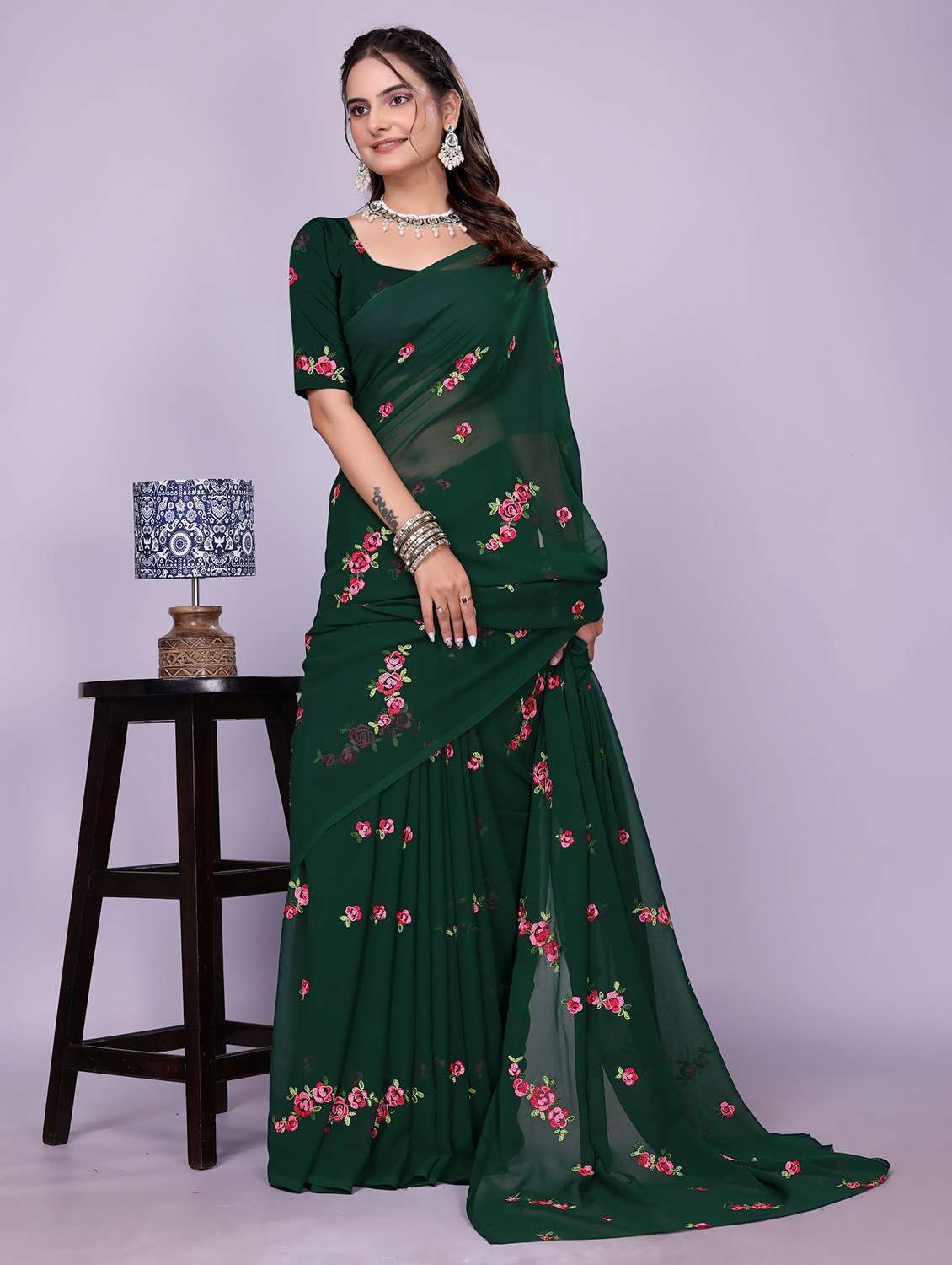 women green embroidered saree with blouse