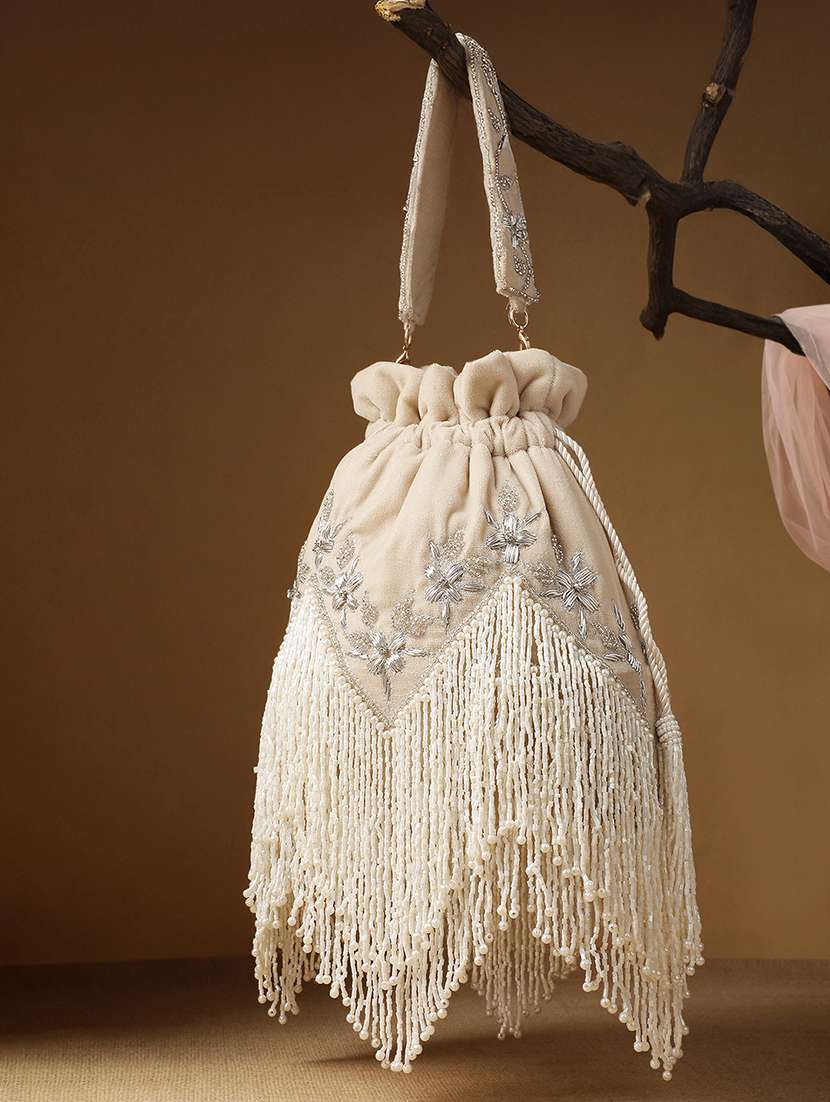 embroidered velvet potli with fringe