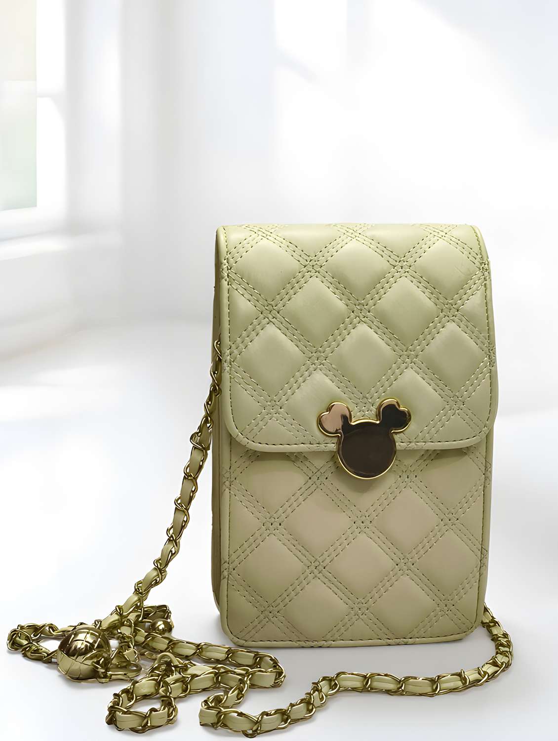 quilted sling bag with chain strap  - 22147342 -  Standard Image - 2