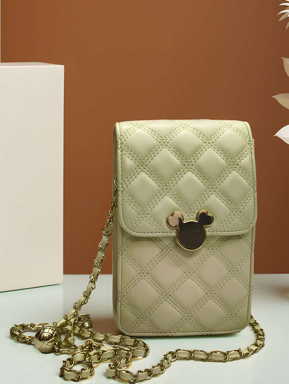 quilted sling bag with chain strap