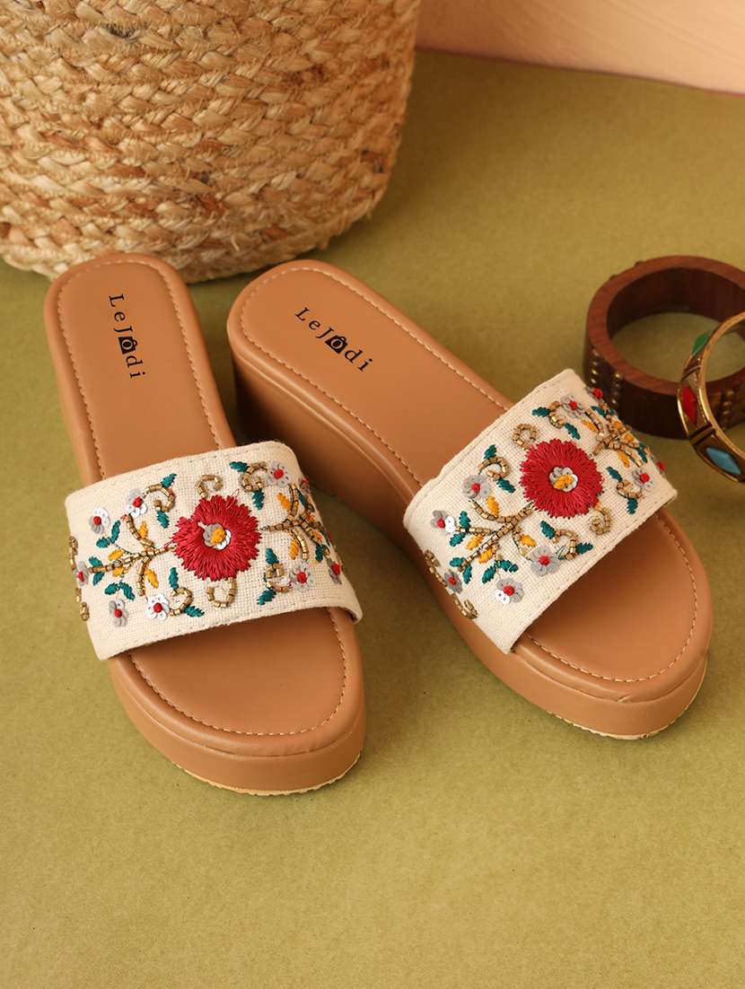 women embroidered slip on sandal