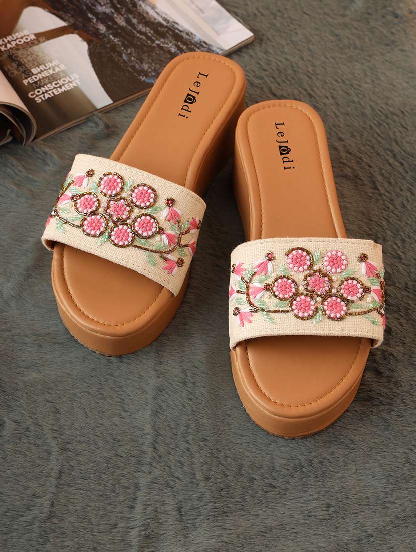 women embroidered slip on sandal