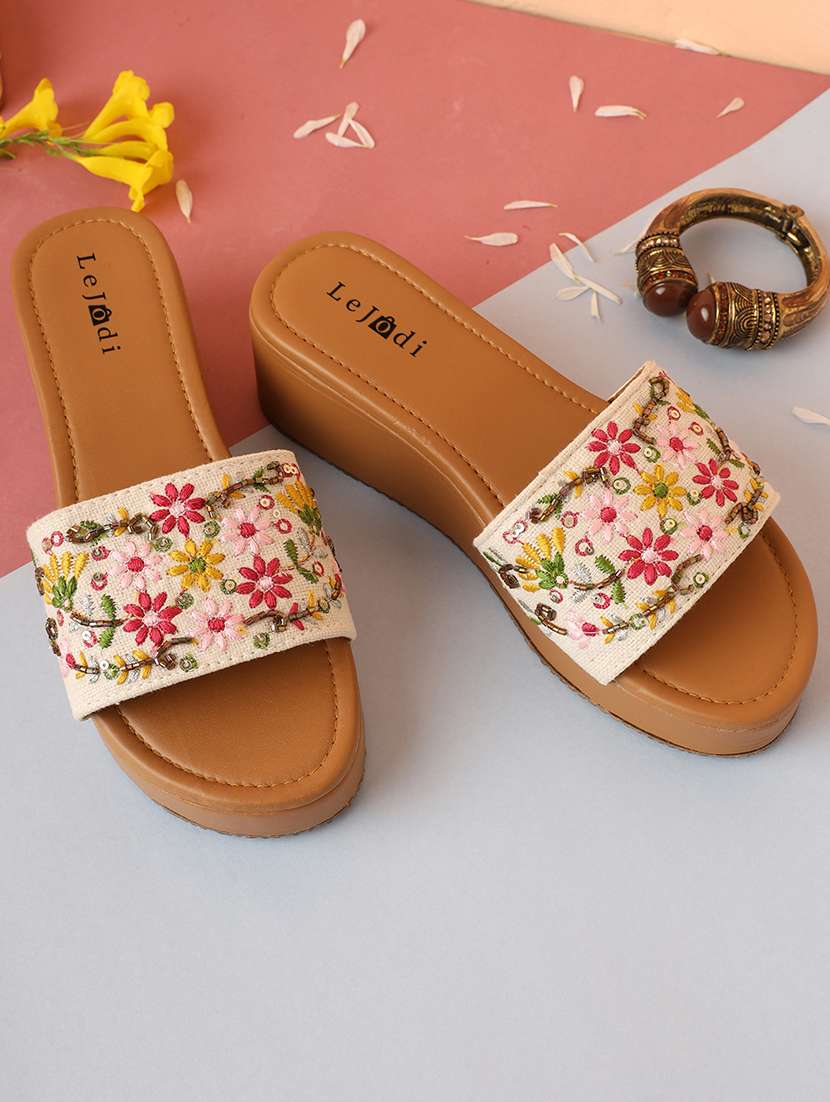 women embroidered slip on sandal