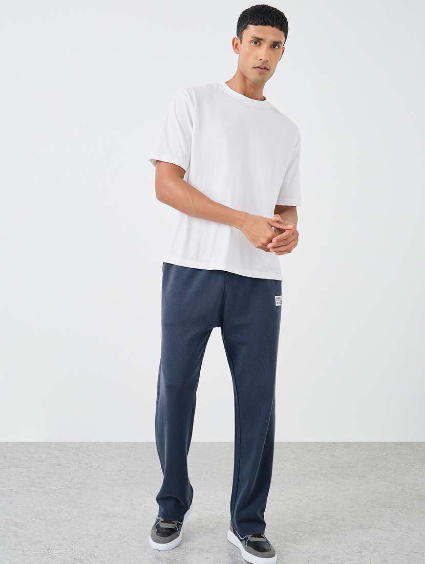 men solid mid rise full length track pant - 22174777 -  Standard Image - 2