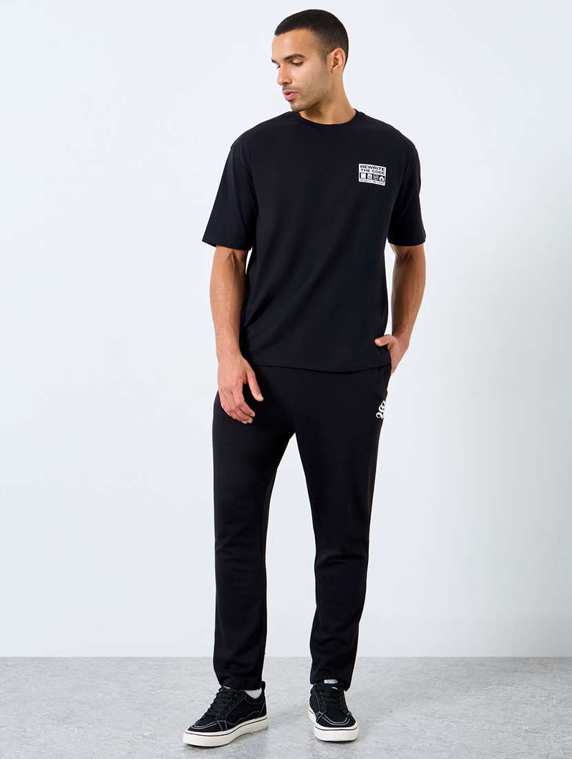 men solid mid rise full length track pant - 22174778 -  Standard Image - 2