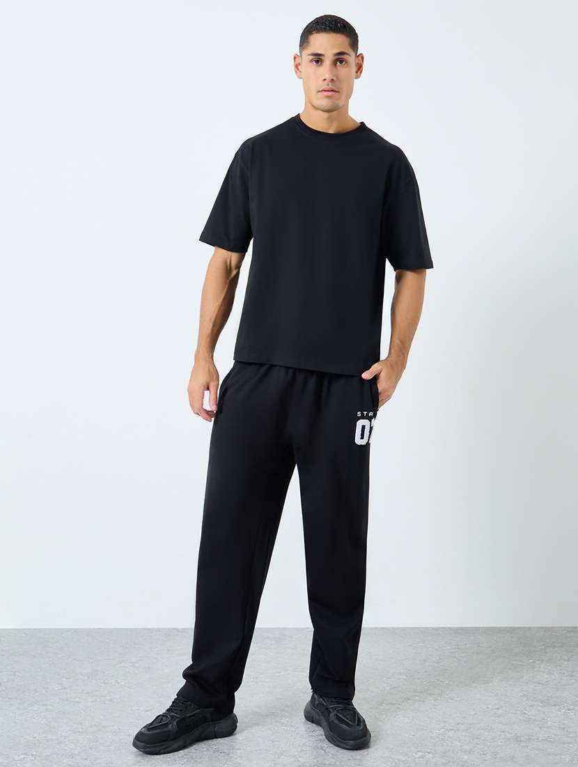 men solid mid rise full length track pant - 22174786 -  Standard Image - 2