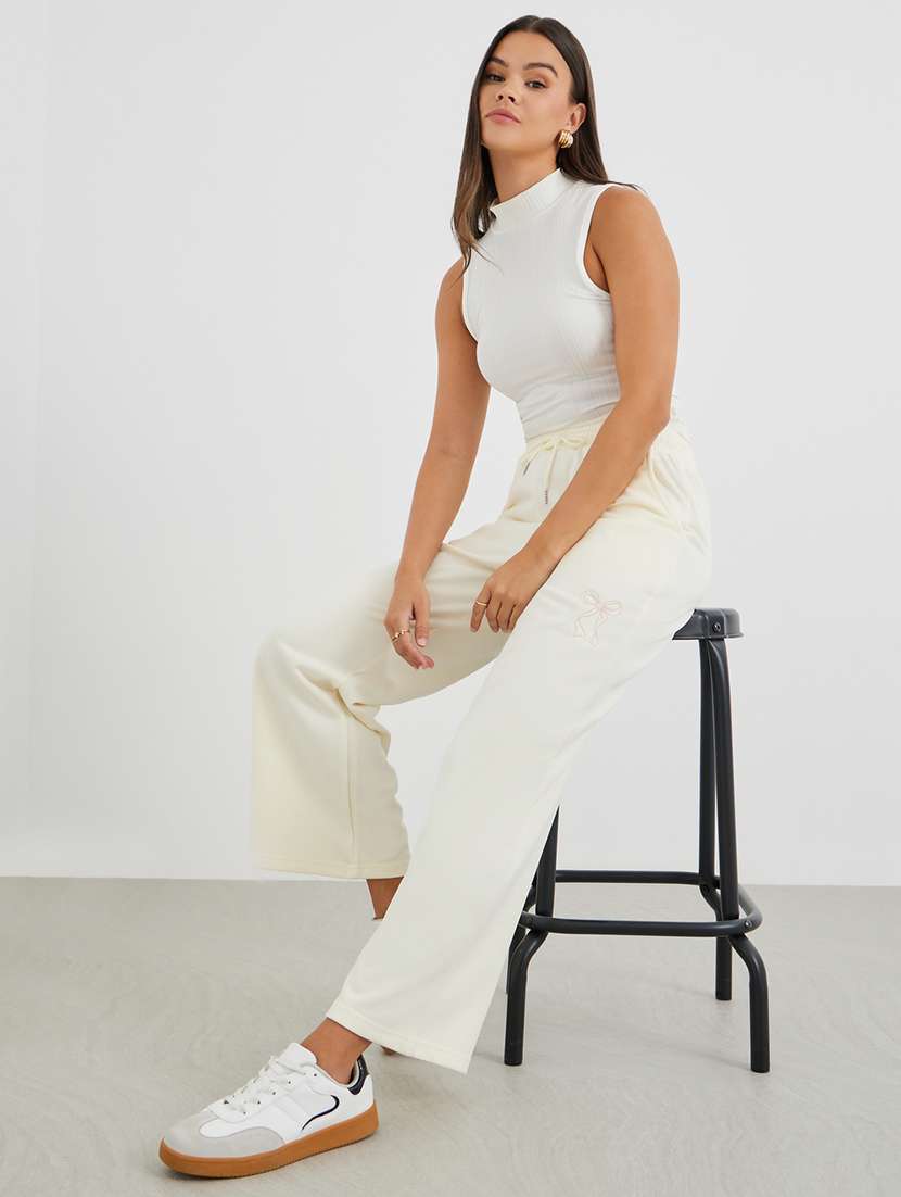 women solid mid rise track pant - 22176730 -  Standard Image - 2