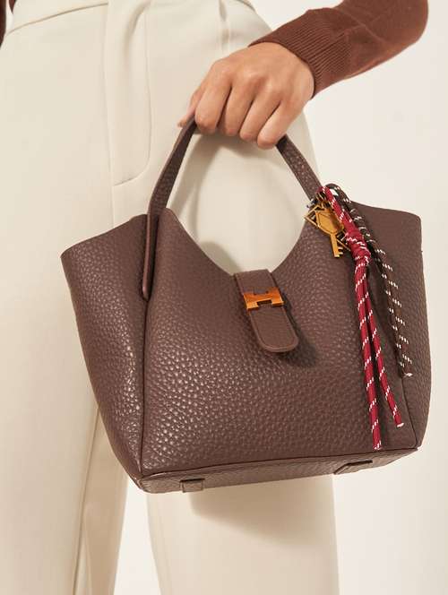 women brown solid handbag - 22176755 -  Standard Image - 0