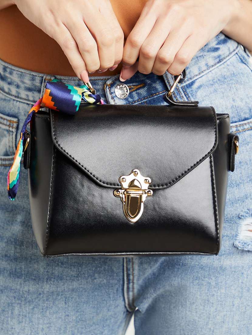 women black solid handbag