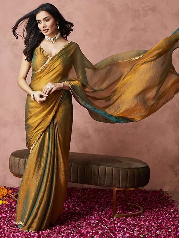 women solid with embellished bordered saree with blouse