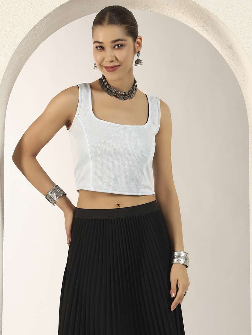 women solid sleeveless stitched blouse