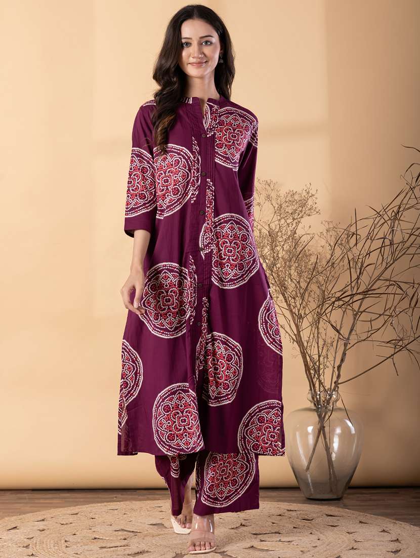 women bandhani printed three quarter sleeve kurta palazzo set