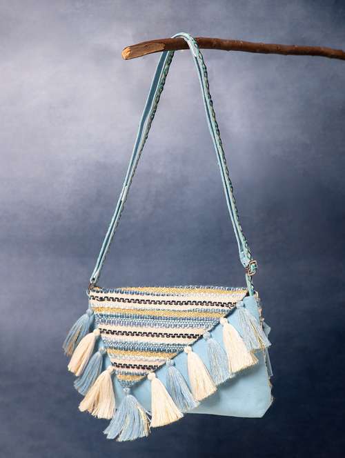 women striped sling bag with tassels - 22220093 -  Standard Image - 0