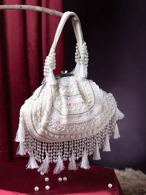 women embellished cream velvet clutch with tassels - 22220135 -  Standard Image - 0