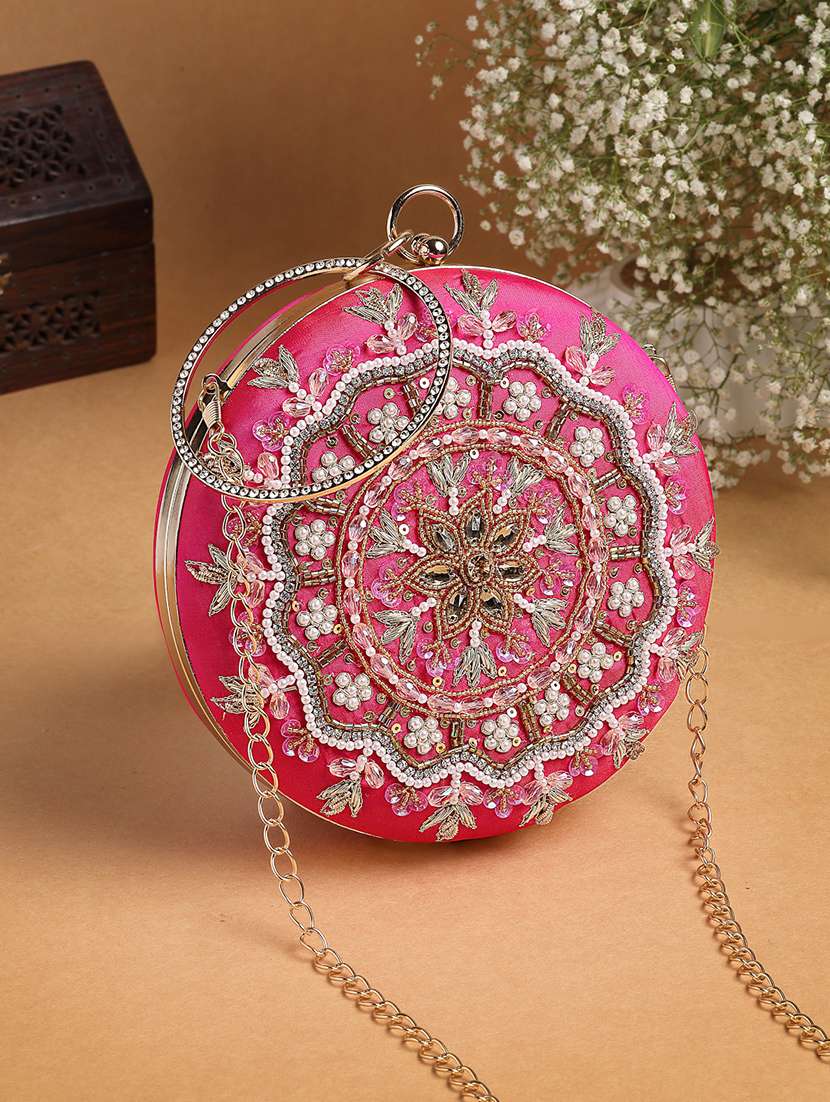 pink embellished faux silk party clutch