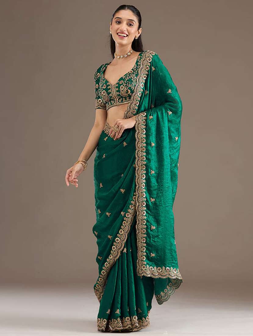 women solid with work embroidered saree with blouse