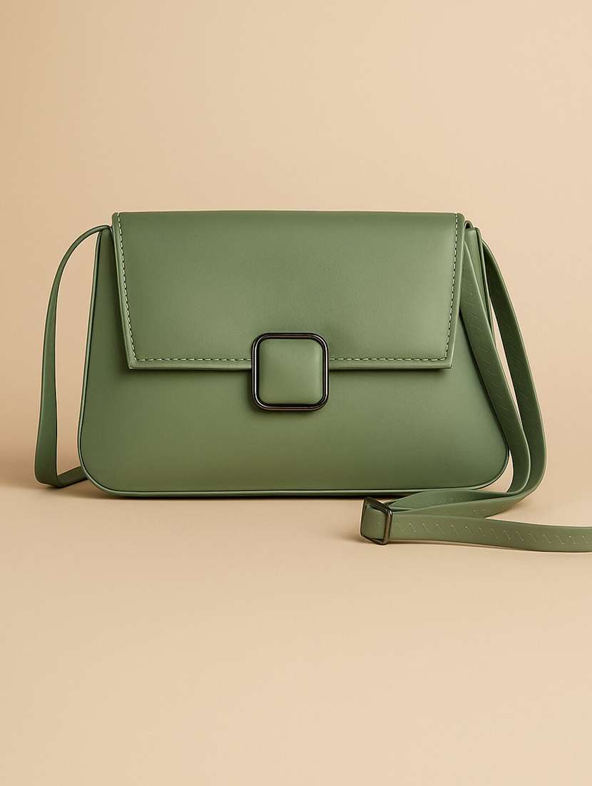women's green sling bag with buckle closure