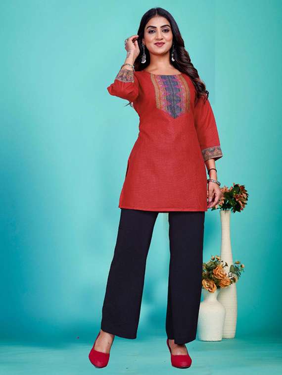 women embroidered three quarter sleeve kurti