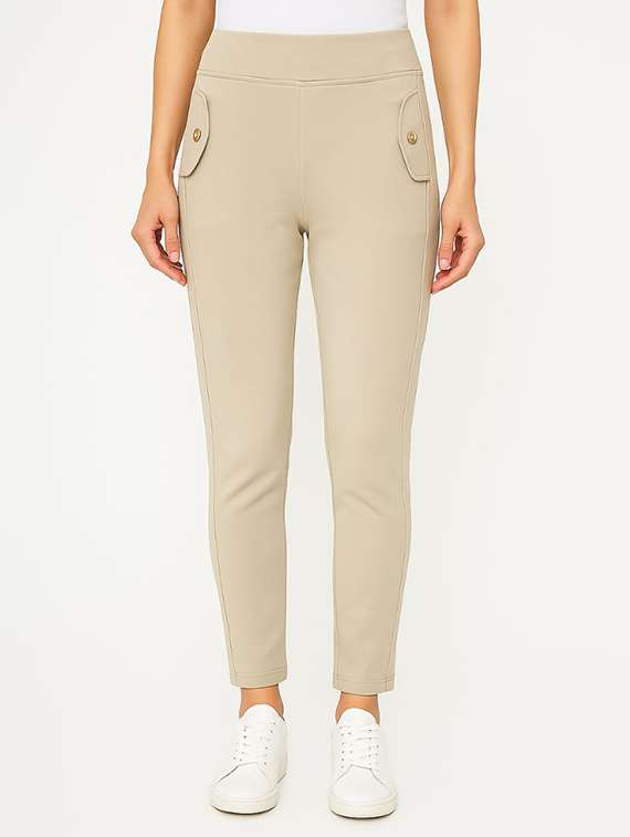 women beige solid mid rise jegging