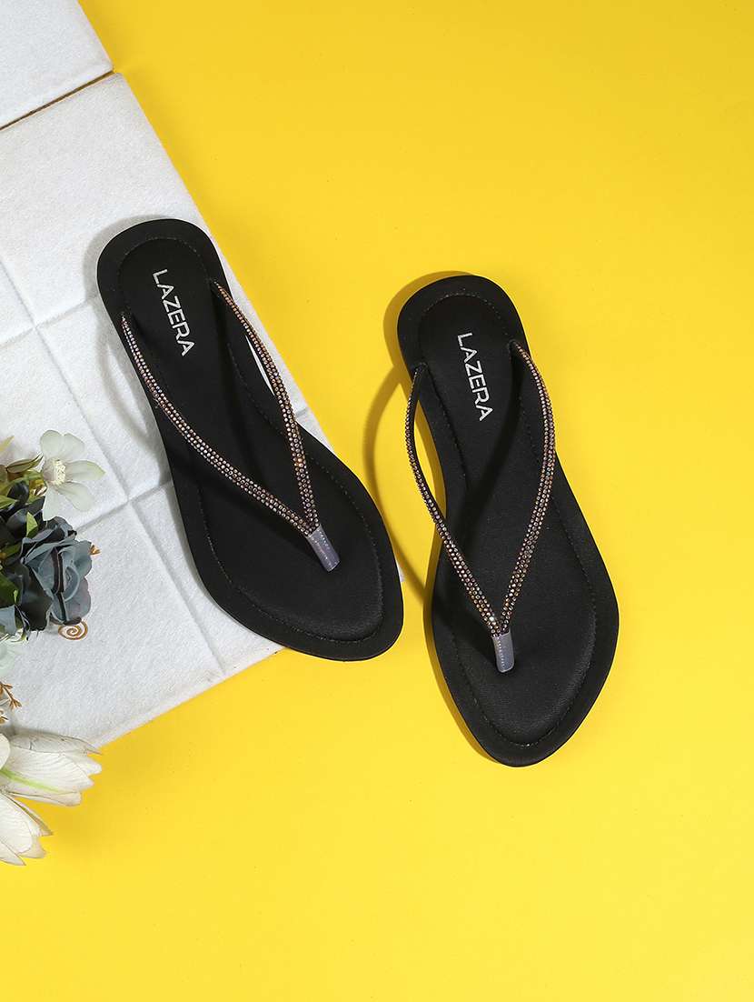 women slip on flat sandal