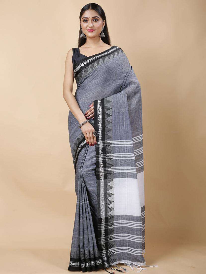 women solid with bordered handloom saree