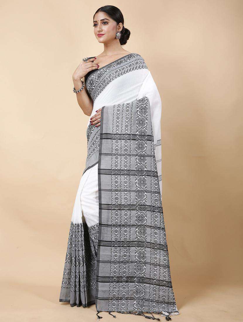 women solid with bordered handloom saree