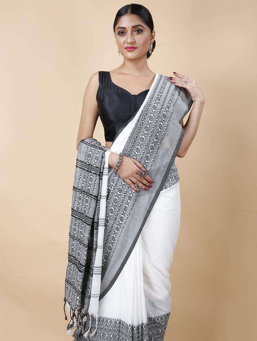 women solid with bordered handloom saree - 22261484 -  Standard Image - 2