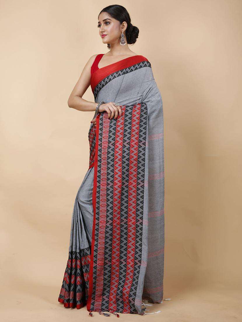 women solid with bordered handloom saree