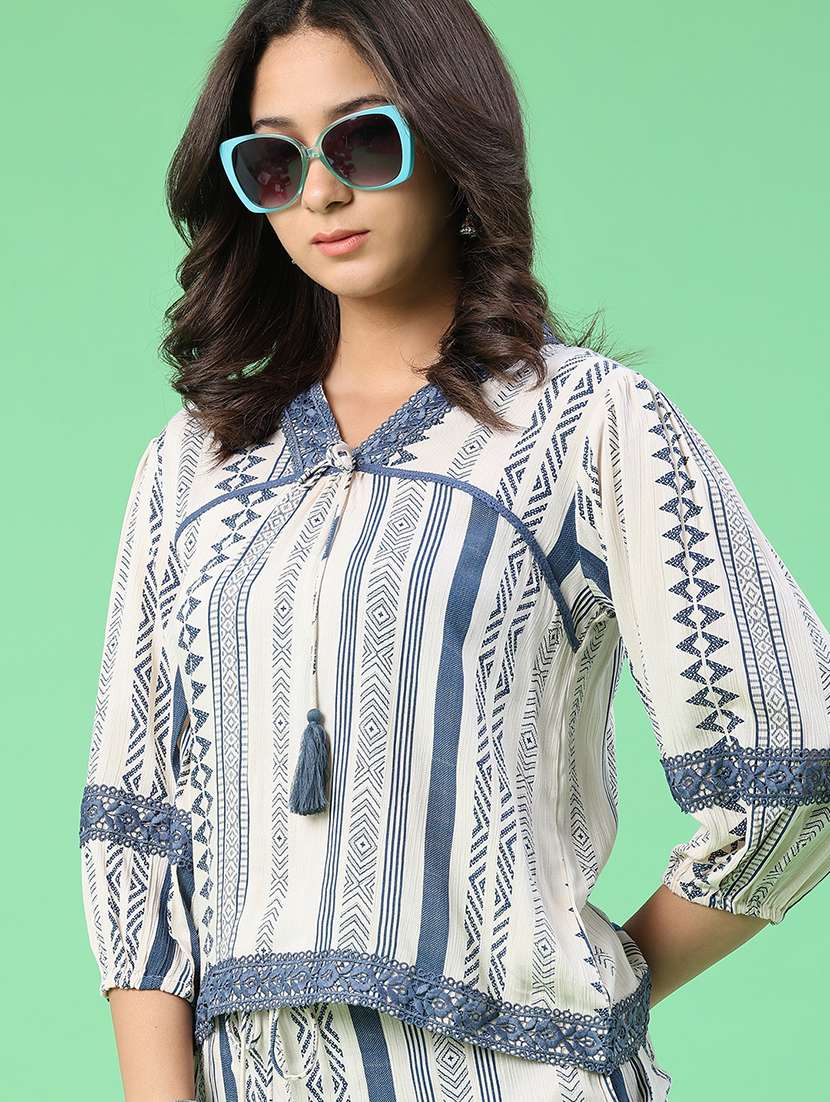 women printed three quarter sleeves regular top