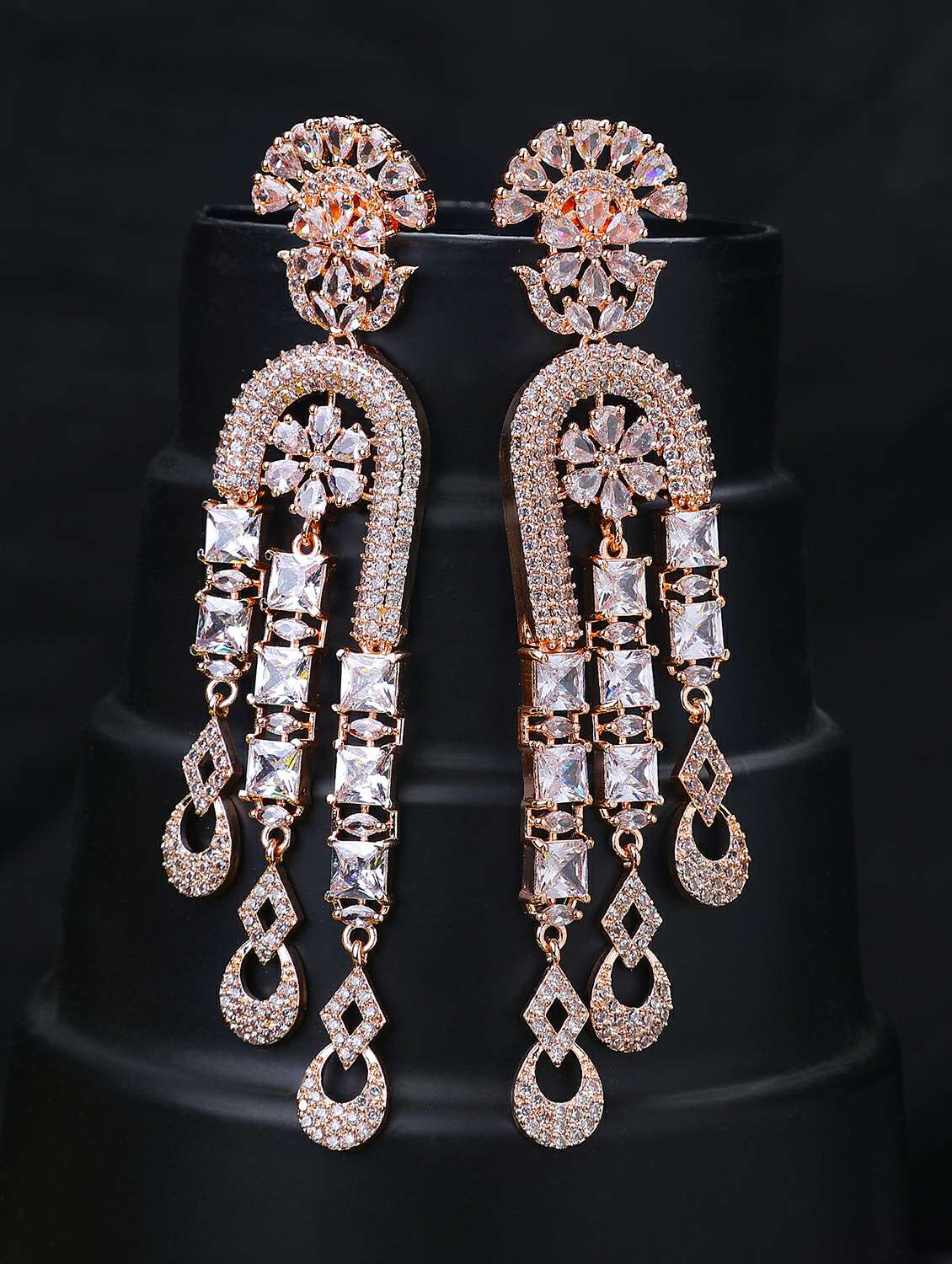 women stone studded dangle earrings