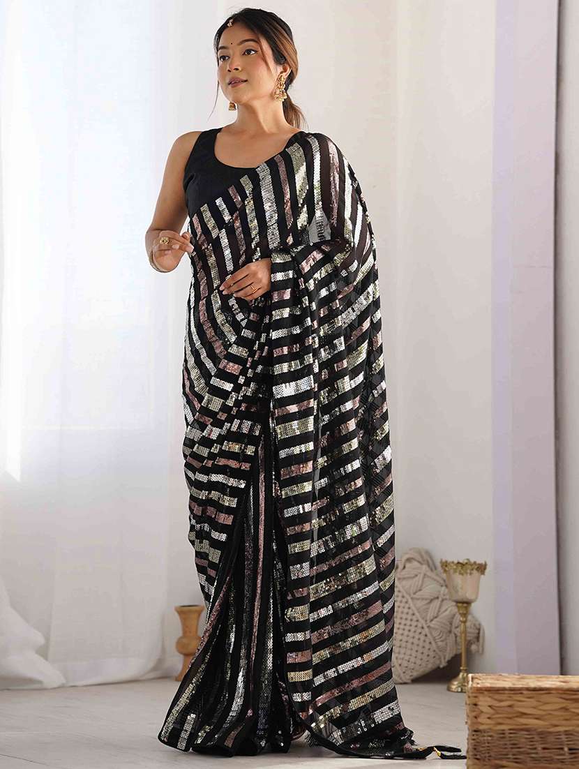 women solid with work embellished saree with blouse