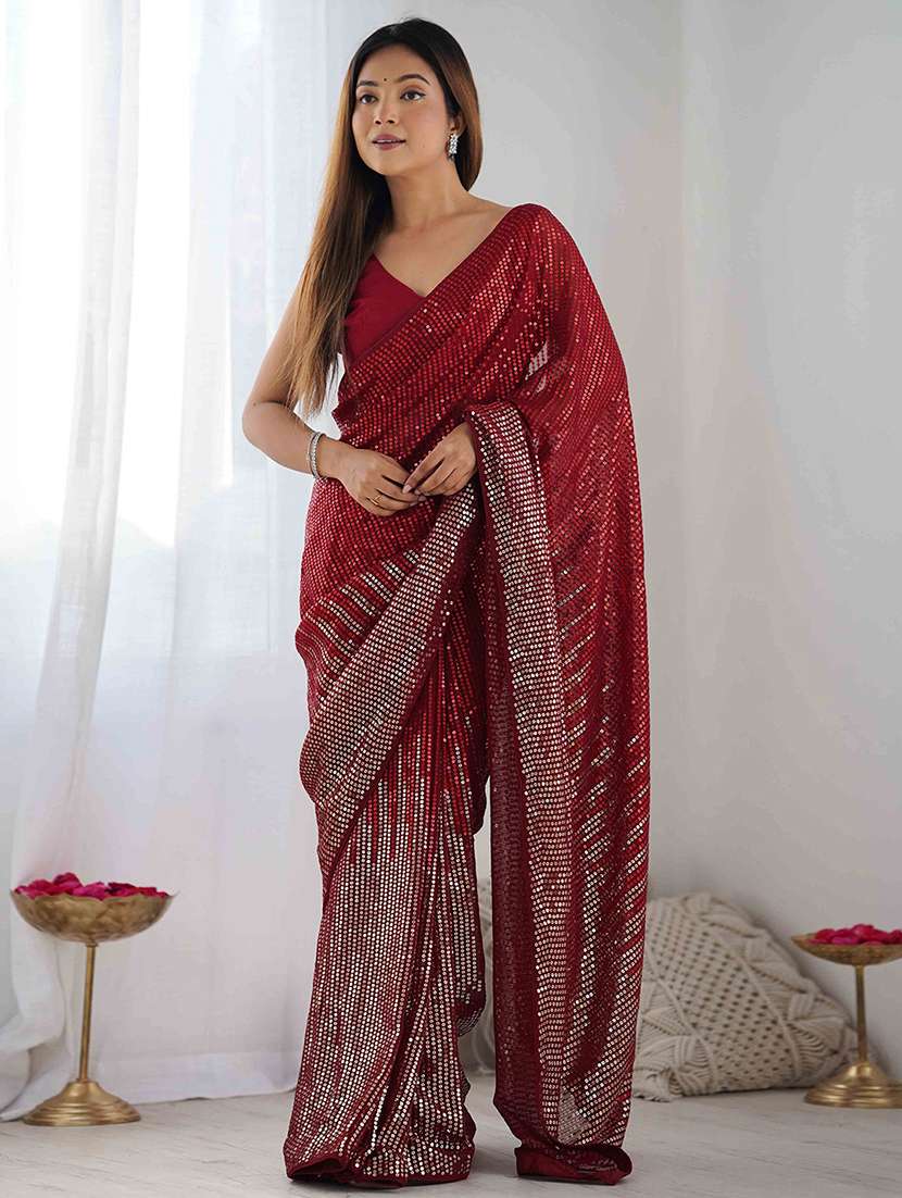 women solid with work embellished saree with blouse