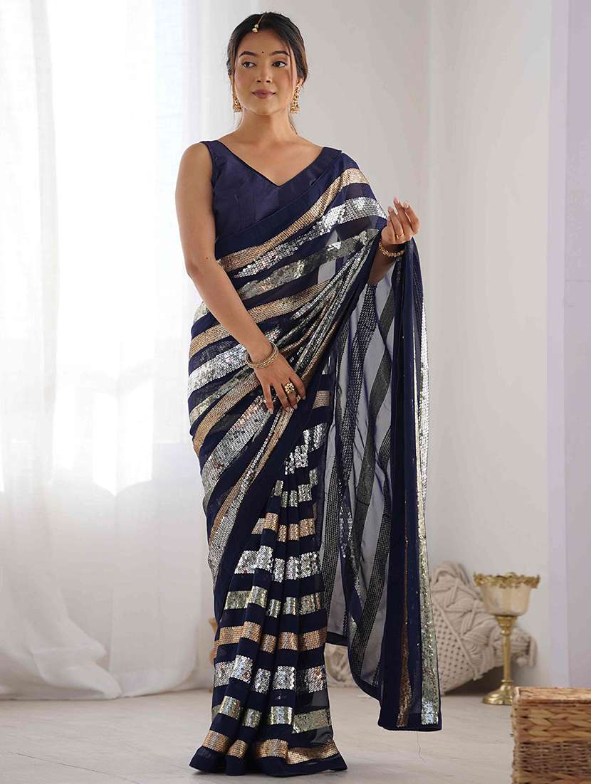 women solid with work embellished saree with blouse