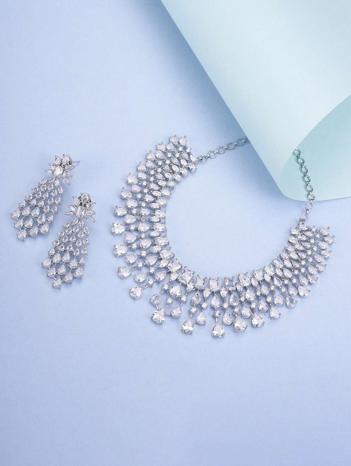 women stone studded necklace and earring set