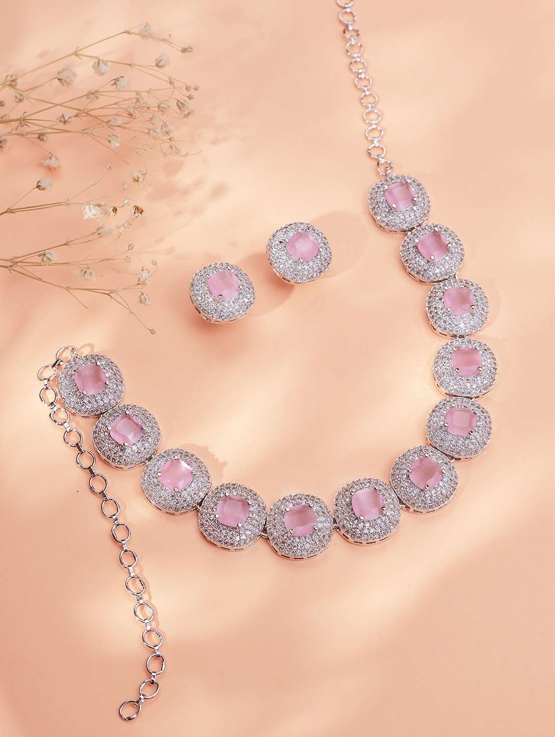 women stone studded necklace and earring set