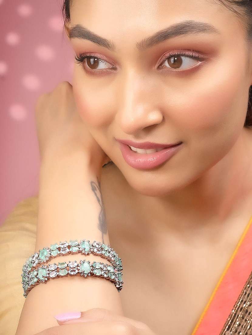 women green brass bangle - 22278198 -  Standard Image - 2