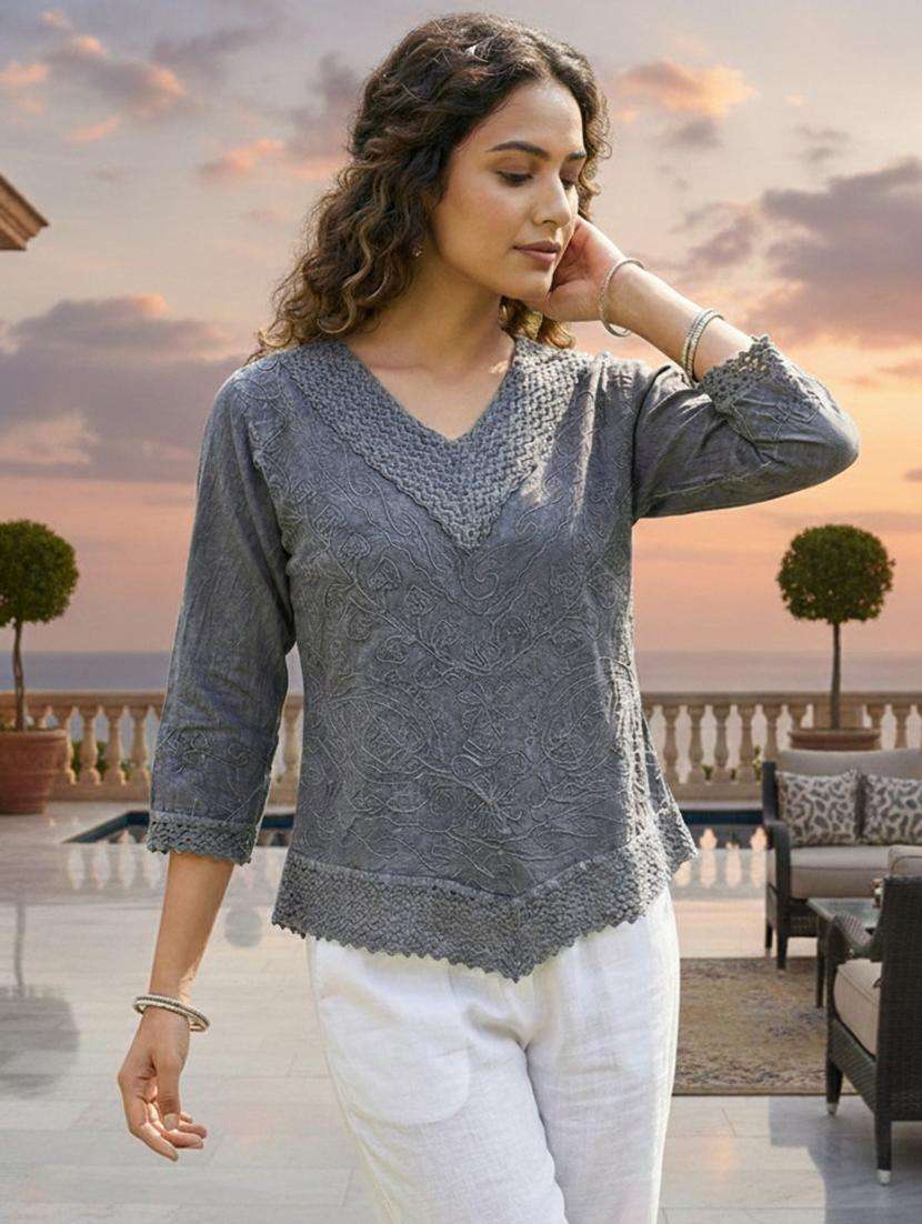 women embroidered three quarter sleeve short kurti